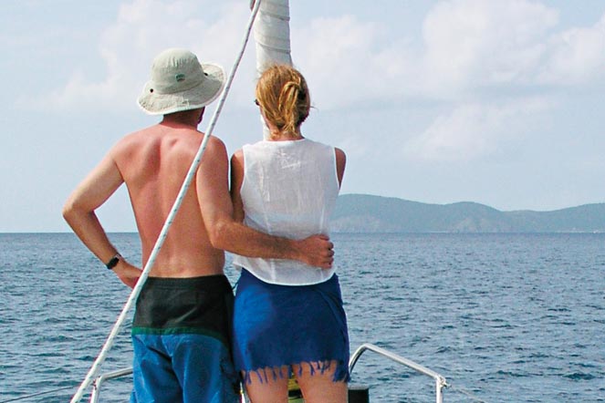 Photograph of couple sailing in the Caribbean.